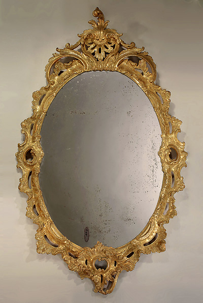 A George II / III Carved Giltwood Oval Mirror, c1755-60