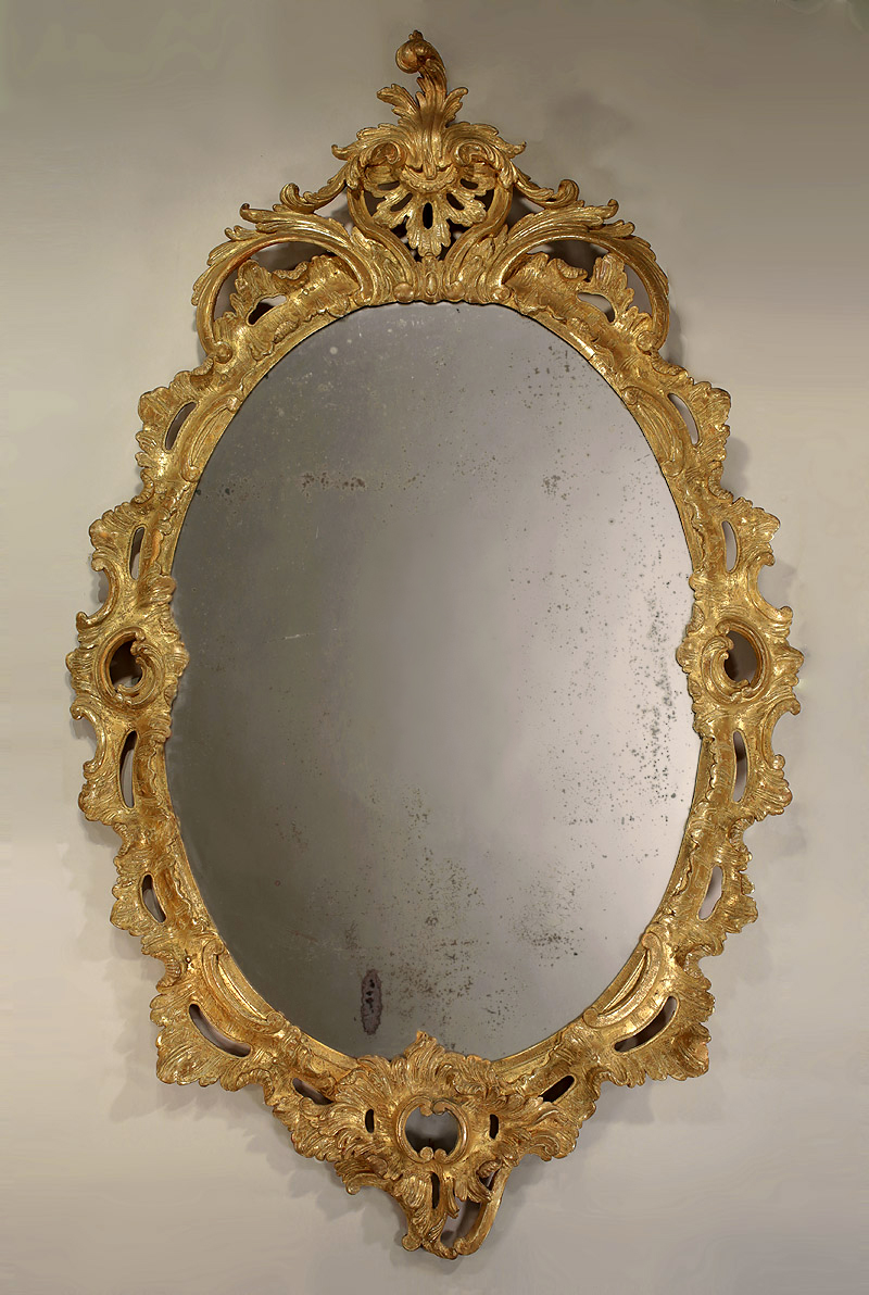 Early George III Oval Carved Giltwood Mirror, England, c1760 