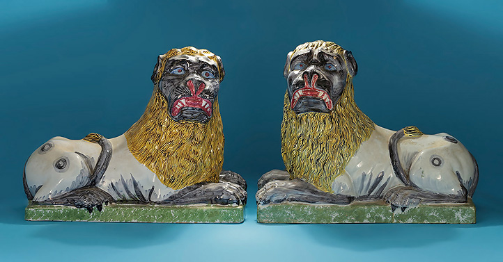 A Rare Large Pair of French 'Faience' Polychrome Seated Lions, Luneville, France, c1800